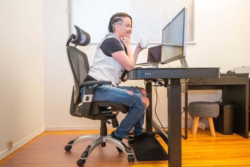 woman working from home at her ergonomic desk